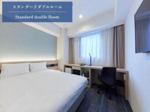 Ліжко або ліжка в номері Henn na Hotel Kagoshima Tenmonkan