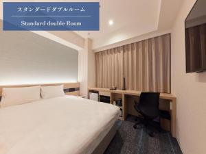 Ліжко або ліжка в номері Henn na Hotel Kagoshima Tenmonkan