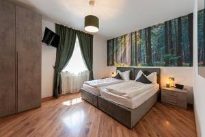 Cama ou camas em um quarto em Kyrr Smart Mountain Retreat