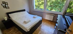 Tempat tidur dalam kamar di Apartament Gdynia Babie Doły