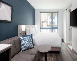 Ένα ή περισσότερα κρεβάτια σε δωμάτιο στο Hyatt Place New York Chelsea