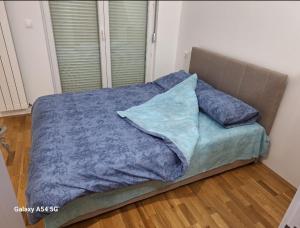 Ліжко або ліжка в номері Apartman Centrala