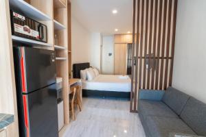 Katil atau katil-katil dalam bilik di Alyxia 1 Bedroom Apartment in Central Seminyak