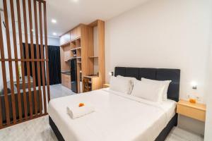 Katil atau katil-katil dalam bilik di Alyxia 1 Bedroom Apartment in Central Seminyak