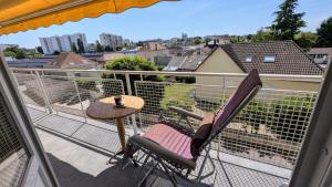 En balkon eller terrasse på Balcon du Cube