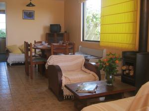 A seating area at Cabañas Caleta San Pedro