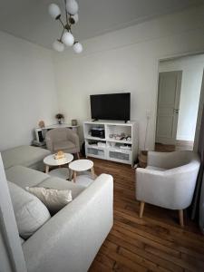 Μια τηλεόραση ή/και κέντρο ψυχαγωγίας στο Appartement Porte de Versailles