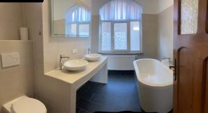 Bathroom sa Eisenach - Apartments