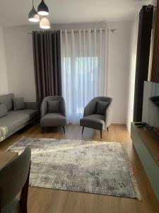 Зона вітальні в Enjoy Shkodra Apartament