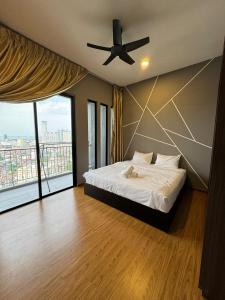 Tempat tidur dalam kamar di Cozy Comfort- Beacon Executives Suite