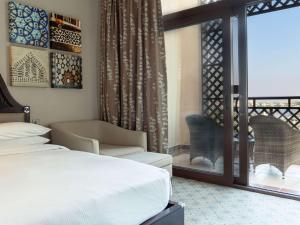 Cama ou camas em um quarto em Rixos Al Mairid Ras Al Khaimah - Ultra All Inclusive