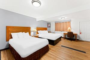 Krevet ili kreveti u jedinici u okviru objekta Americas Best Value Inn Stonington Mystic