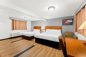 Krevet ili kreveti u jedinici u okviru objekta Americas Best Value Inn Stonington Mystic