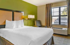 Vuode tai vuoteita majoituspaikassa Extended Stay America Select Suites - Grand Rapids - Kentwood