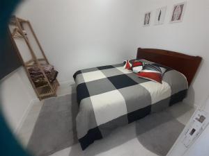 Una cama o camas en una habitación de Lourisol