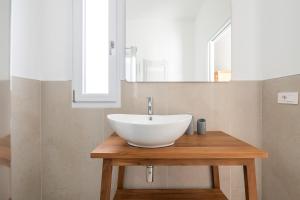 A bathroom at Olbia Rooms