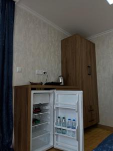 A kitchen or kitchenette at Panorama Bagrati