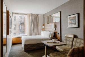 Ліжко або ліжка в номері Club Quarters Hotel Grand Central, New York