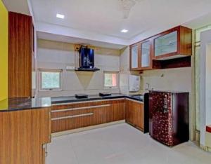 Kitchen o kitchenette sa Super Collection O Vardhan House