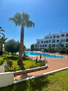 Bazén v ubytování Appartement Kabila Vista à 10min à pied de la plage nebo v jeho okolí