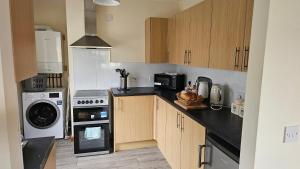 Una cocina o kitchenette en The Apartment at Brook House