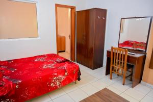 A bed or beds in a room at Gini Palace - Shengjin