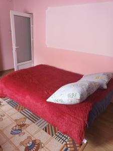 A bed or beds in a room at Тушер