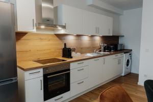 Η κουζίνα ή μικρή κουζίνα στο CityHeart Appartement - Stadt Mitte - Stilvoll