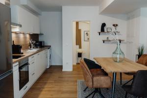 Η κουζίνα ή μικρή κουζίνα στο CityHeart Appartement - Stadt Mitte - Stilvoll