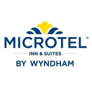 a logo for a microsoft inc and suites by worshipkin at Microtel Inn & Suites by Wyndham Amarillo West in Amarillo