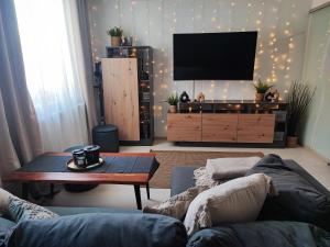 En TV eller et underholdningssystem på Ferienwohnung im Harz