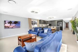 Televisor o centre d'entreteniment de Riverside 4 Bedroom House Unit in Surfers Paradise