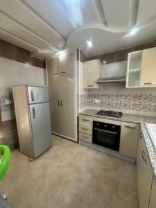 Кухня или кухненски бокс в Appartement souai