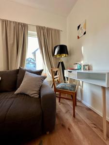 Et opholdsområde på Charmantes Luxus Maisonette- Apartement