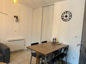 Zona d'estar a Appartement cosy rue Pasteur