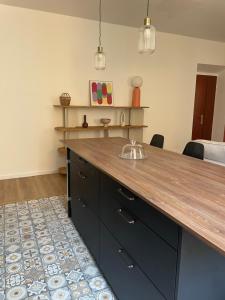 Η κουζίνα ή μικρή κουζίνα στο Superbe appartement 2 chambres plein centre