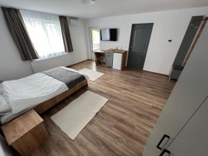 Ліжко або ліжка в номері Salin Home