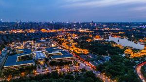 an aerial view of a city at night at Gran Melia Xi'an in Xi'an