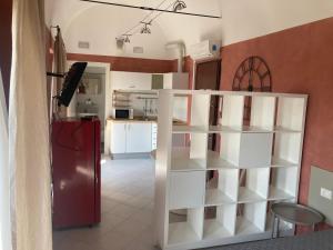 A kitchen or kitchenette at Gerenzano Apartments