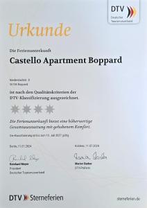 Un certificado, premio, letrero u otro documento en Castello Apartment Boppard