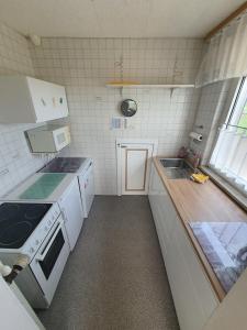 Virtuvė arba virtuvėlė apgyvendinimo įstaigoje Ferienwohnung-zum-Kueppchen