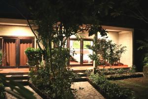 En hage utenfor Kebun Rohani Cottages