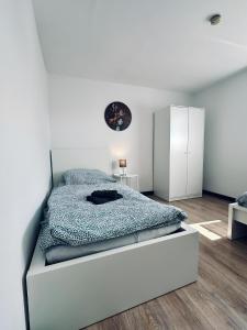 Llit o llits en una habitació de Apartment OchtrUP I - in absolut ruhiger Gegend