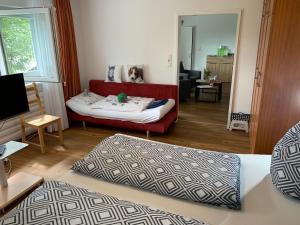 Una cama o camas en una habitación de Ferienwohnung Heimweg