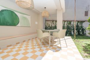 Um jardim em Green Guest House Alghero