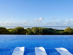 Poolen vid eller i närheten av Pullman Mazagan Royal Golf & Spa