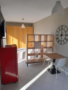 A kitchen or kitchenette at Gerenzano Apartments