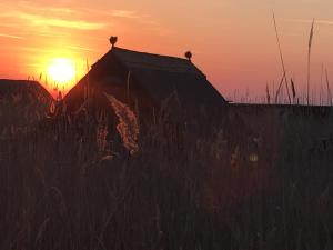 The sunrise or sunset as seen from the holiday home or nearby