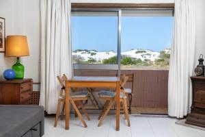 Balcony o terrace sa Barra Beach House - Praia da Barra