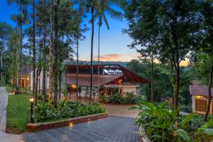 A garden outside Theyila Wayanad Premium Pool Resort